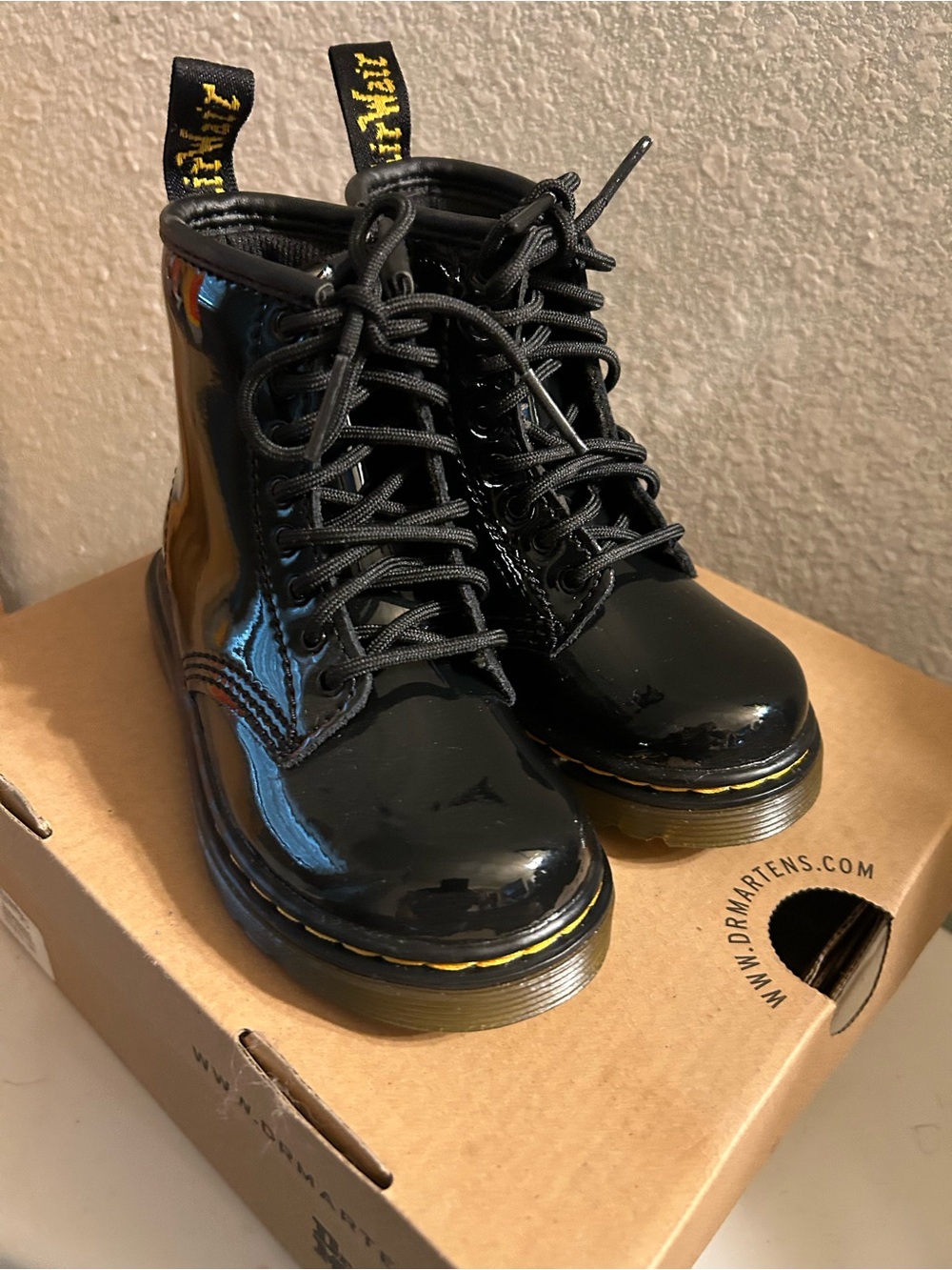 Dr. Martens Black Patent Lace-Up Ankle Boots with Yellow Stitching
